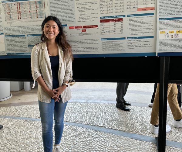 Student in front of USC/CHLA Summer Oncology Research Fellowship Program Program